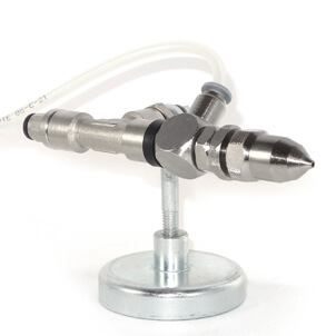 variable venturi injector nozzle for spraying lubricant